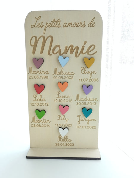 Pancarte "Les petits amours de Mamie" en bois naturel.